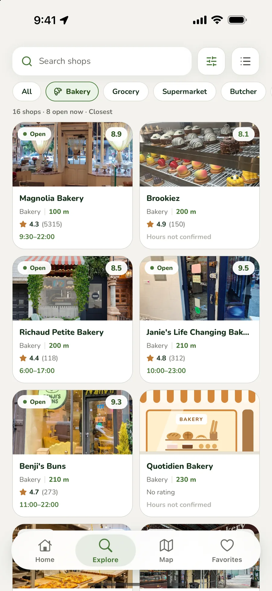 The Auzoko Explore screen with search, categories and nearby shops.