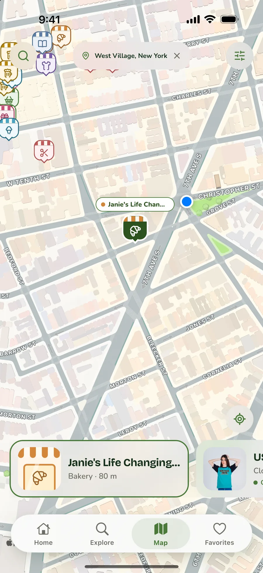 The Auzoko map screen showing nearby shops marked by category.